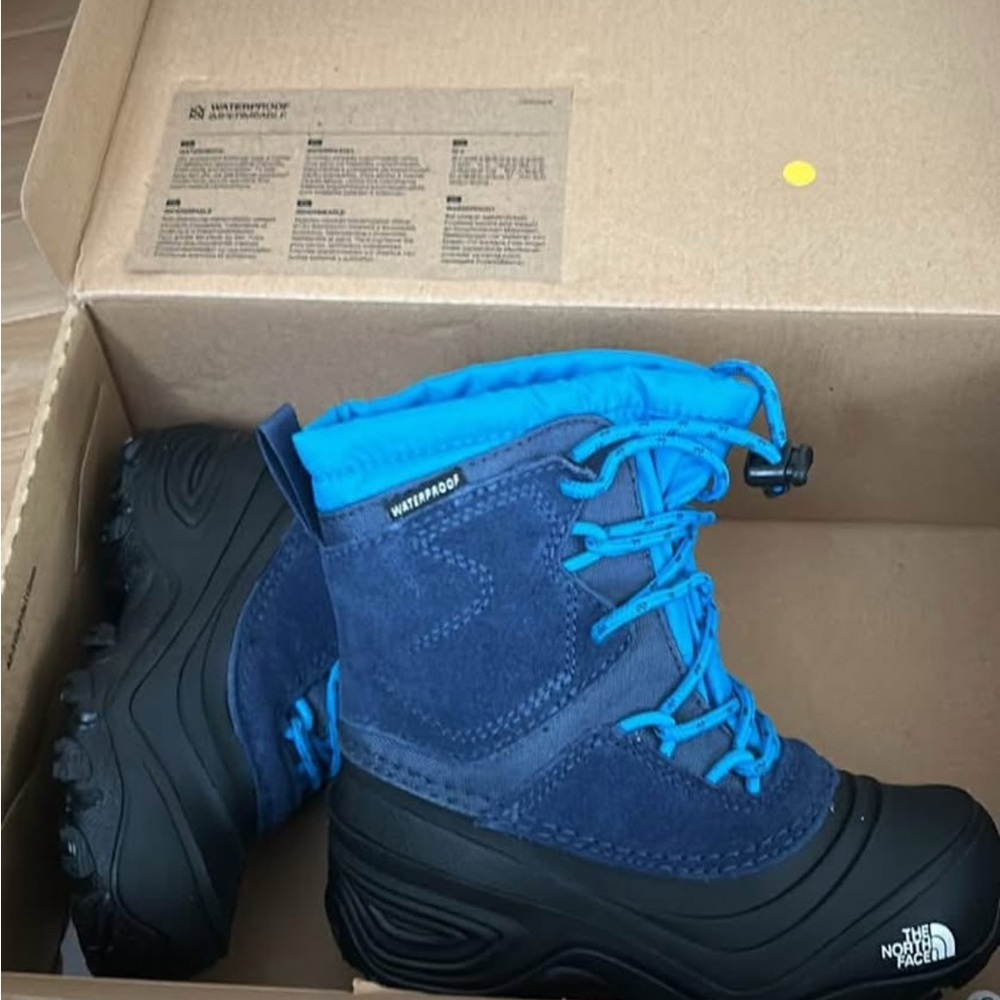 The North Face Blue and Black Winter Boots